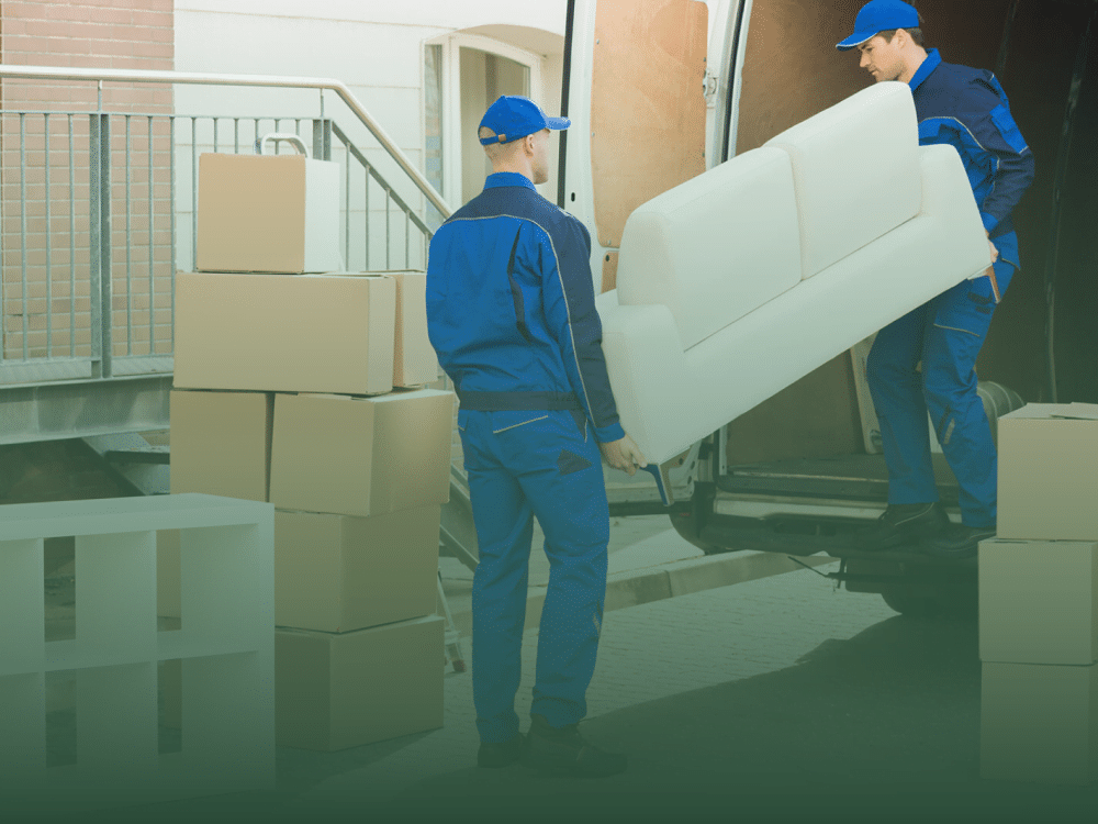 Movers unloading furniture symbolizing the process of relocating to Thailand.