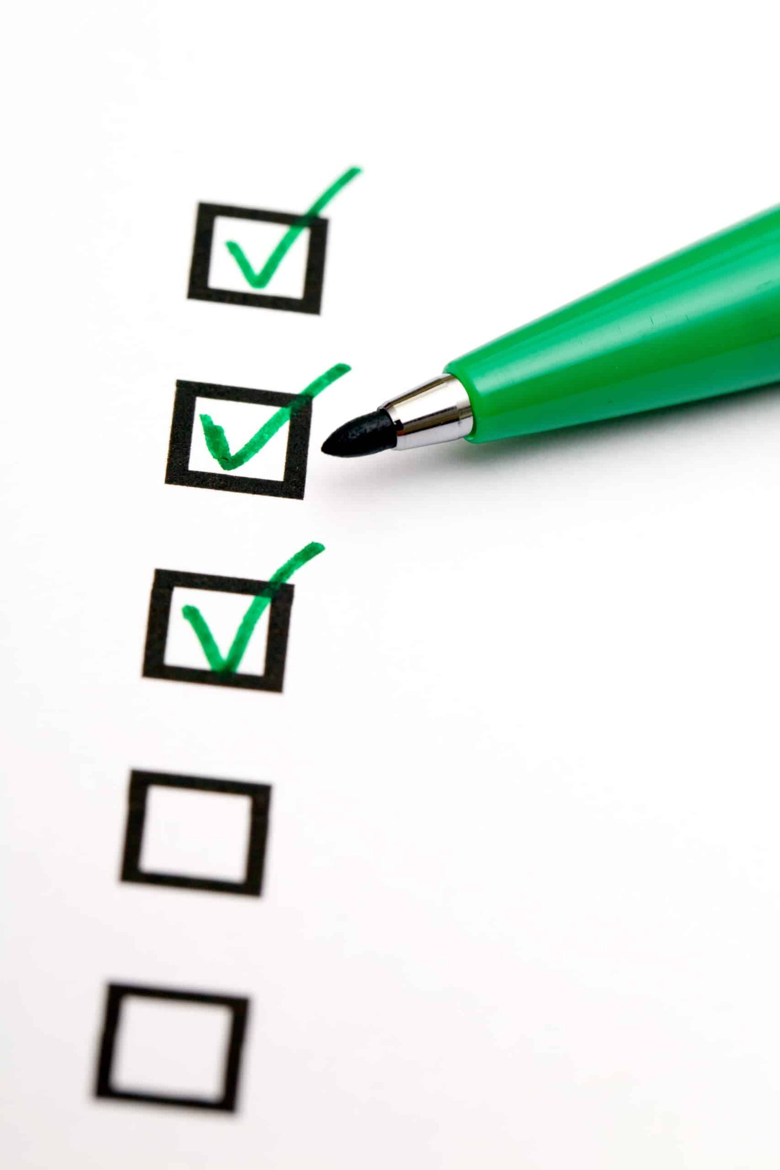 Checklist with green ticks signifying completed steps in the legal process